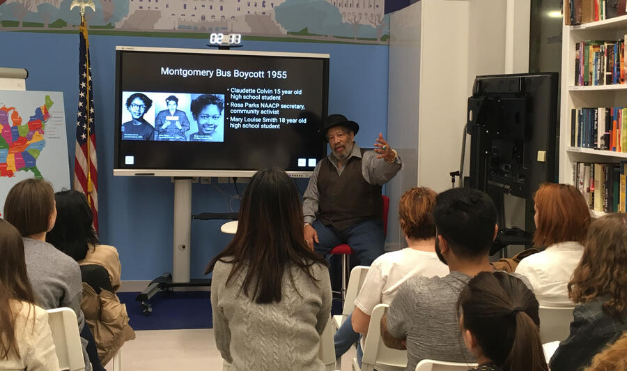 Michael gives a presentation to students